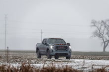 Load image into Gallery viewer, AVS Aeroskin Hood Shield - Black Low Profile with LED Lights for 2019-2022 GMC Sierra 1500