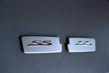 Load image into Gallery viewer, INTERIOR FRONT DOOR HANDLE INSERT BADGE FOR HOLDEN VE SS COMMODORE UTE