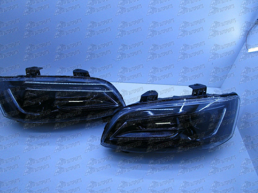 VE SERIES 1 HEADLIGHTS BLACK LED DRL Sequential Indicator HOLDEN COMMODERE NEW