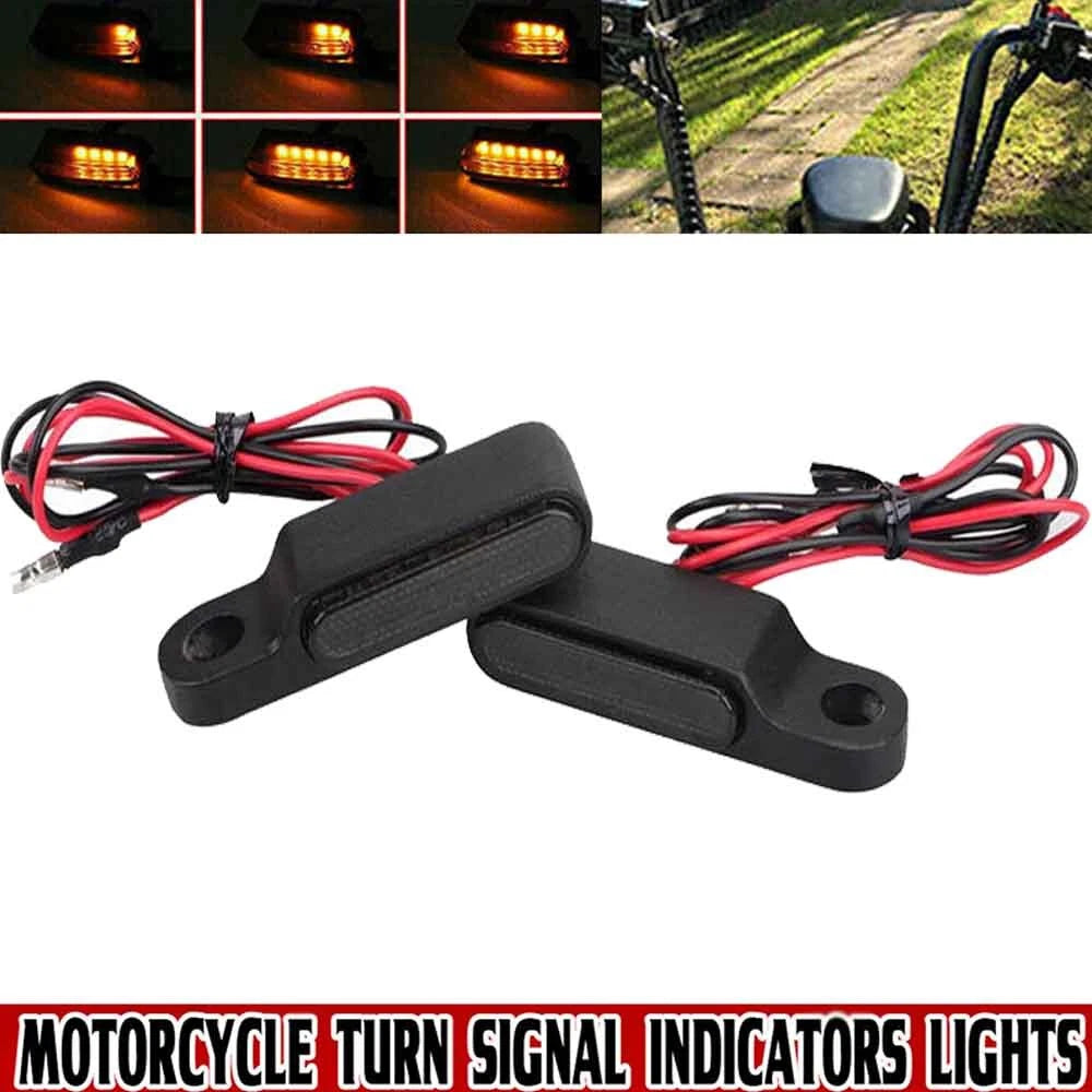 Pair of black E-Mark 6 LED mini motorcycle turn signal indicators with amber light