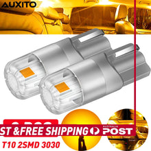 Load image into Gallery viewer, Pair of AUXITO T10 194 amber LED bulbs for 12V car interior, marker and license plate lights