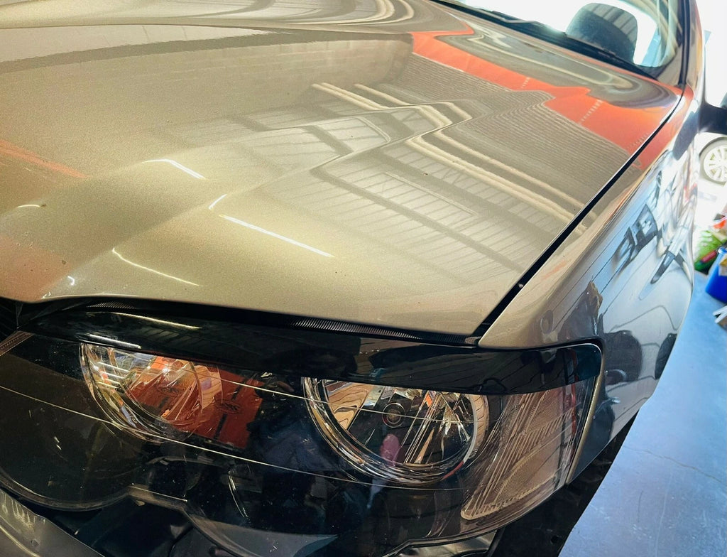 Gloss black headlight eyelid eyebrows pair for Ford BA BF Falcon and FPV models